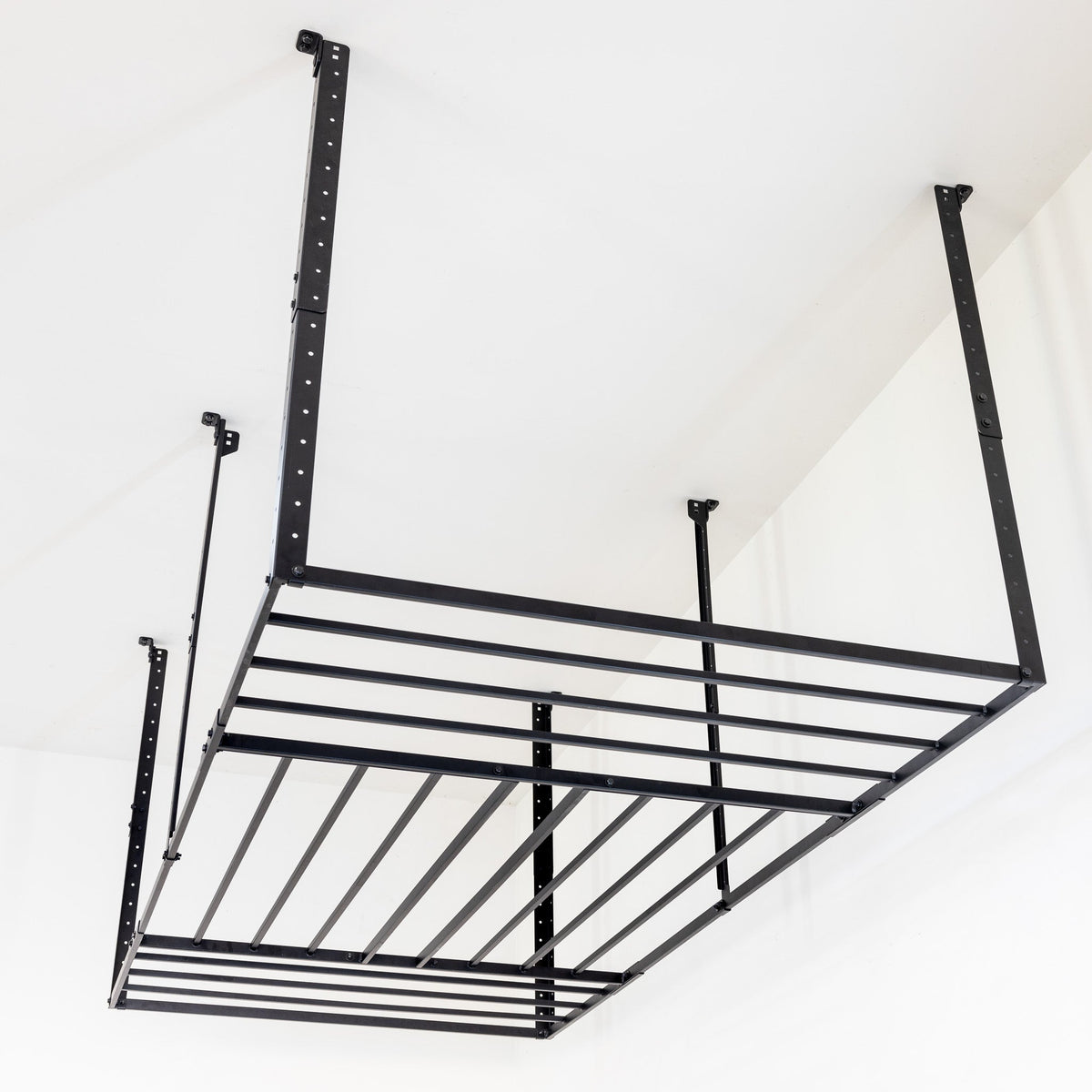 Empty 4 x 8 ft overhead ceiling rack with hooks