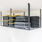 Black 4 x 8 ft overhead ceiling rack holding storage bins and tires