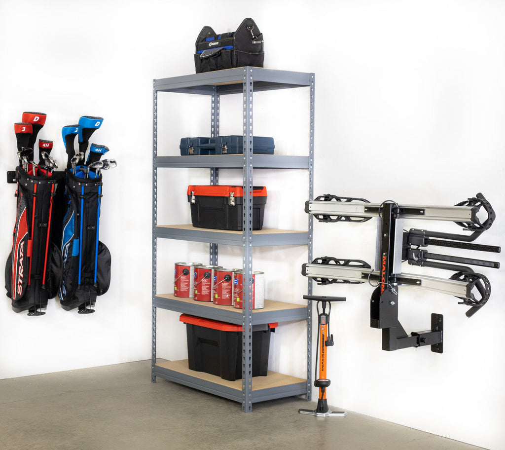Hitch bike rack stored off the floor on the wall mount beside garage shelving