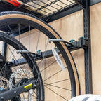 Close-up of bike wheels hanging on the G-Adventure Pro hooks