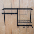 Empty G-Adventure Pro wall system with two wire shelves and hooks