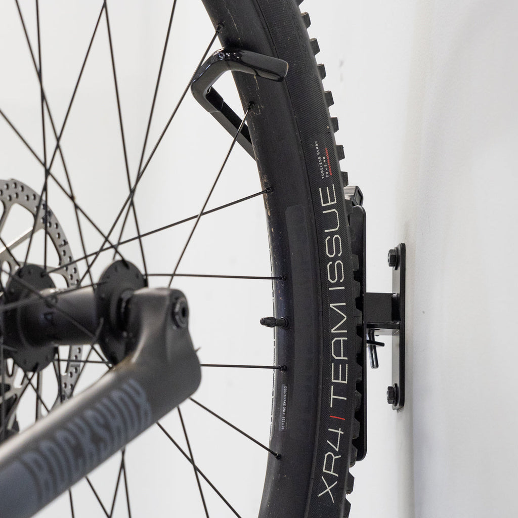 Close-up of a bike wheel on the swivel hook
