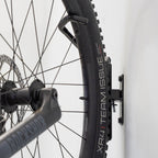 Close-up of a bike wheel on the swivel hook