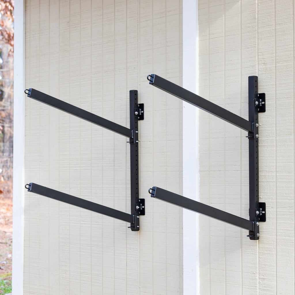 Empty Shenandoah 2-level wall rack mounted on a shed