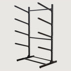 Empty black 4-level freestanding kayak and paddleboard rack