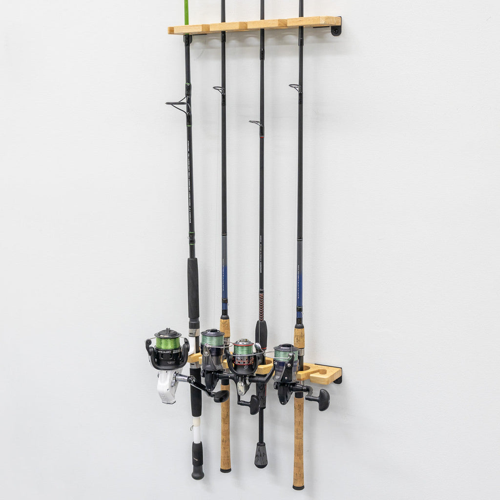 Fishing rods stored vertically on the wood rack