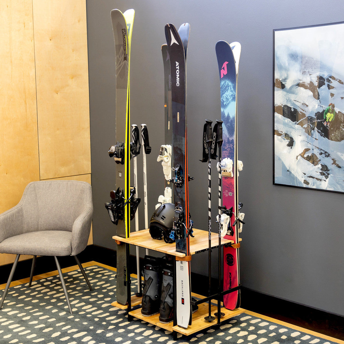 Silverton ski rack holding four pairs of skis and boots in a living space
