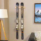 Skis displayed on the Vail wood rack in a living room