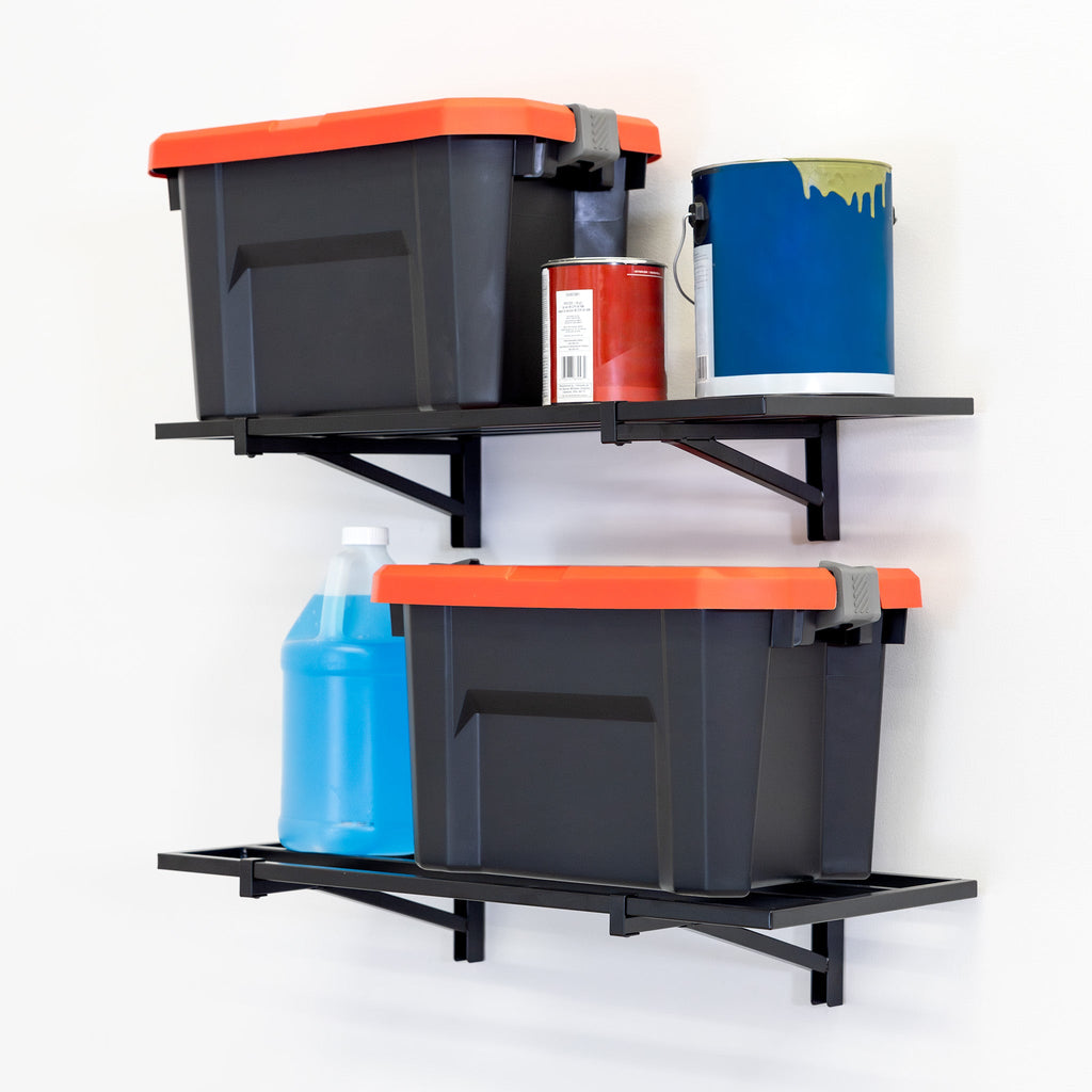 Two black 1 x 2 ft garage wall shelves holding storage bins and supplies