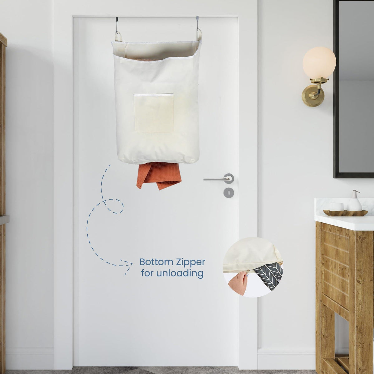 Beige over-the-door hamper unloading clothes through its bottom zipper