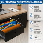 Color-coded hanging folders with labels arranged in a black filing cabinet drawer