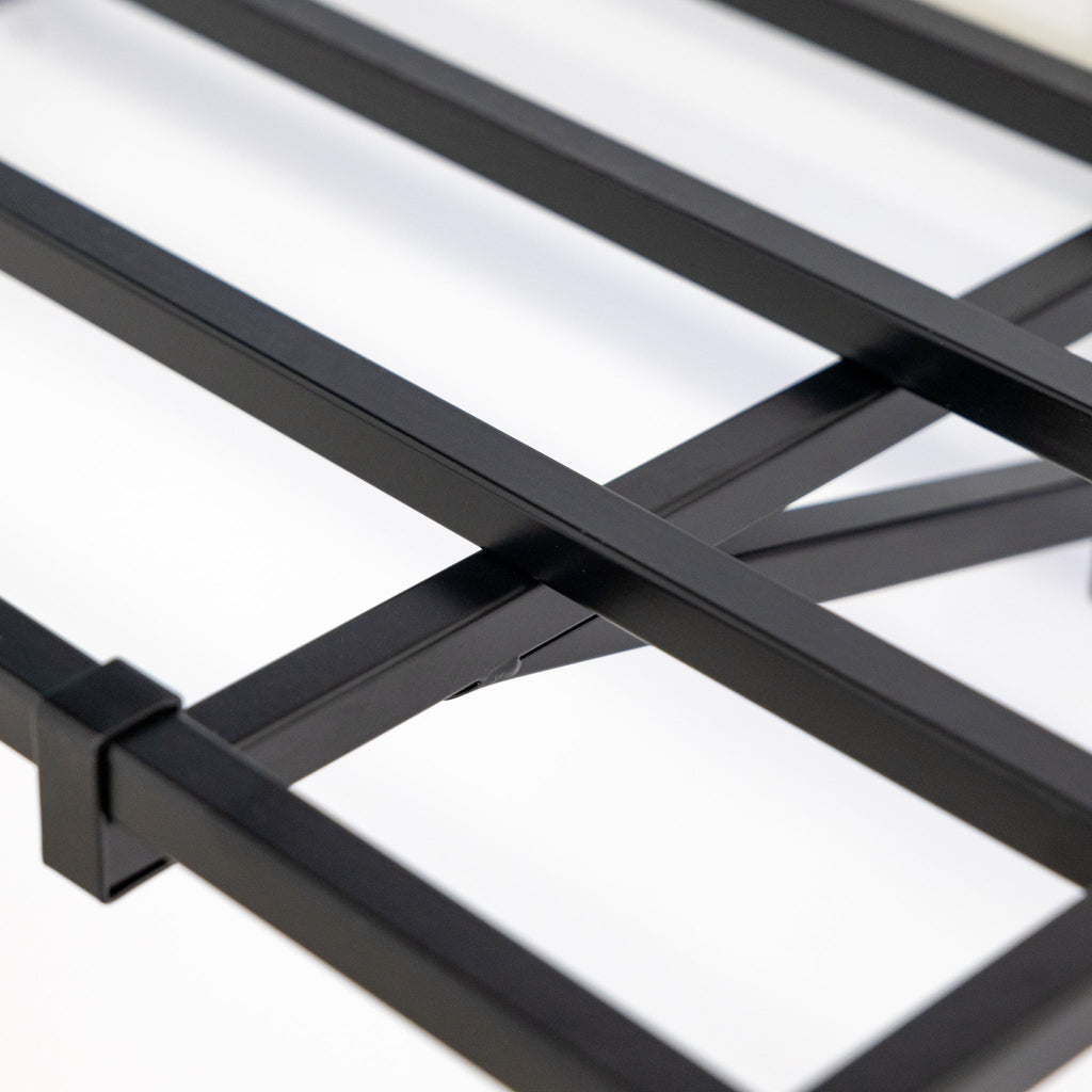Close-up of the black steel shelf frame and bracket