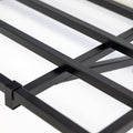 Close-up of the black steel shelf frame and bracket
