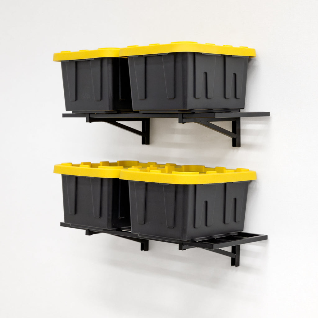 Two black wall shelves each holding two storage totes