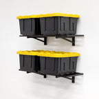 Two black wall shelves each holding two storage totes