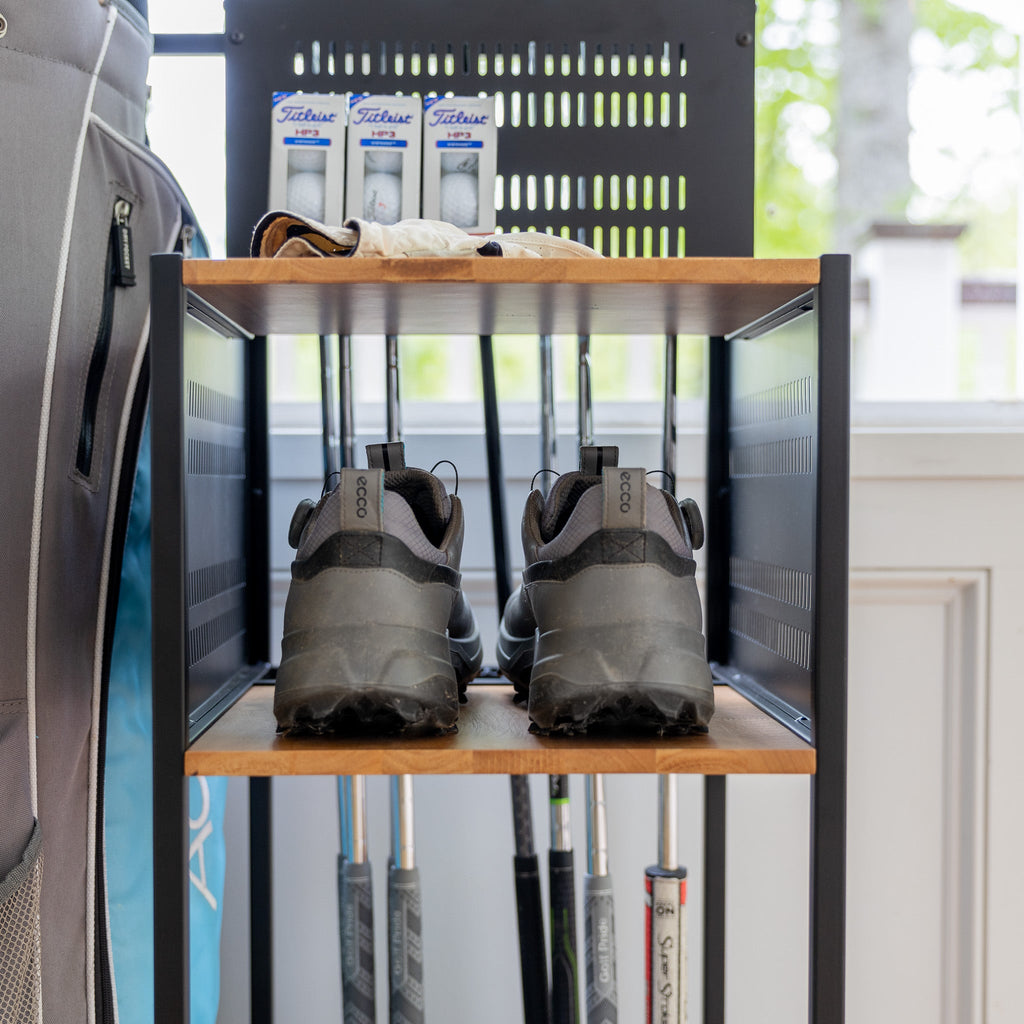 Golf shoes and ball boxes on the organizer shelves