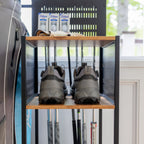 Golf shoes and ball boxes on the organizer shelves