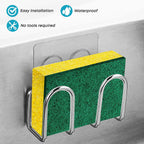 Stainless steel adhesive sponge holder with a green-and-yellow scrub sponge and a no-tool installation graphic