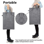 Dark gray hamper being carried by two reinforced long handles