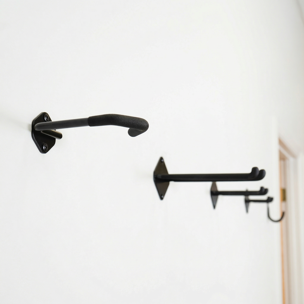 Two Simple Hooks storage hooks mounted on a wall