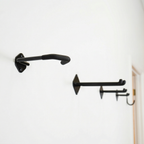 Two Simple Hooks storage hooks mounted on a wall