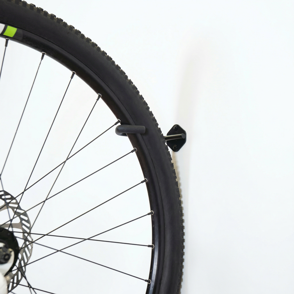Bike wheel hanging on a Simple Hooks bike hook