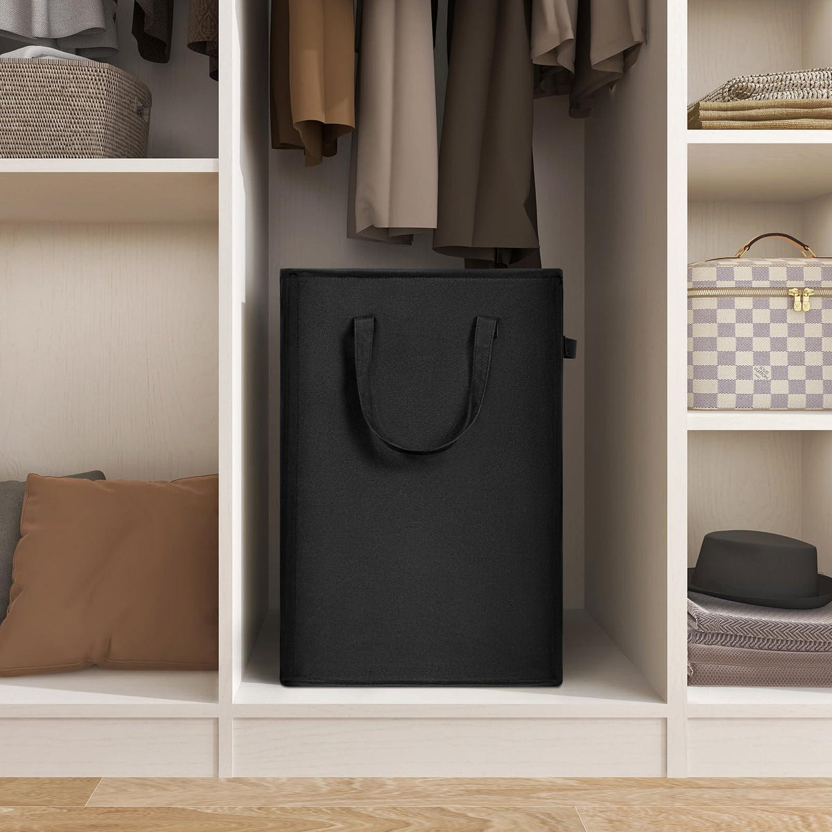 Black slim laundry hamper stored inside a closet