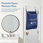 Printed navy laundry hamper hanging behind a bathroom door