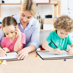 Adult and two children using clear document sleeves for drawing and worksheets