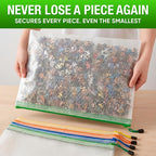 Large mesh zipper bag holding small building pieces with additional bags stacked below