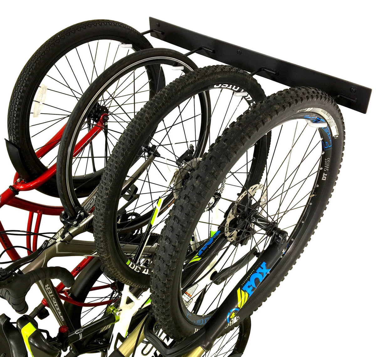 Close-up of bike wheels resting in the rack hooks