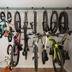 Row of bikes hanging from the CycleSlide ceiling track