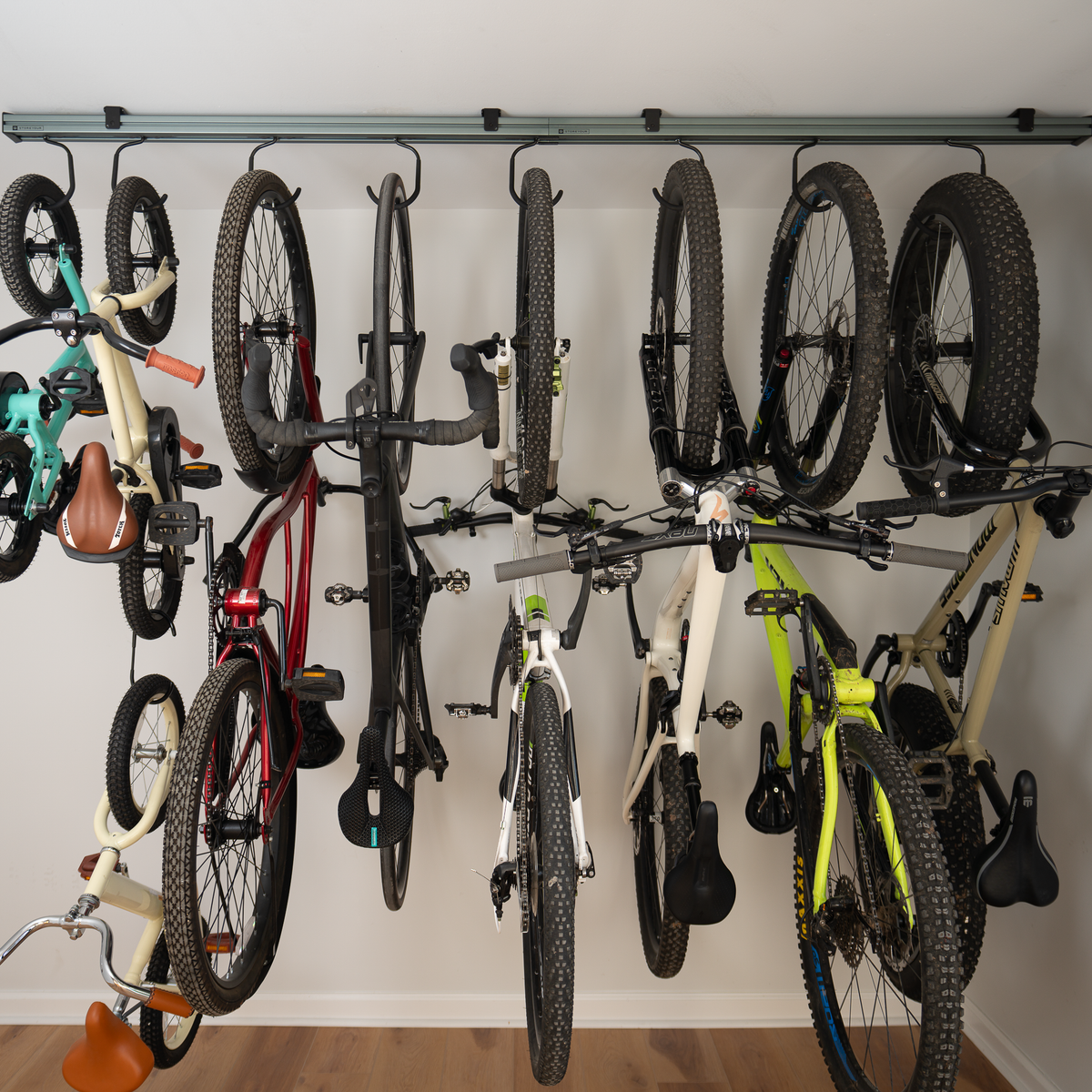 Row of bikes hanging from the CycleSlide ceiling track