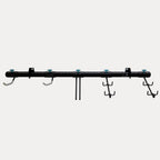 Empty G-Adventure wall rail with adjustable hooks
