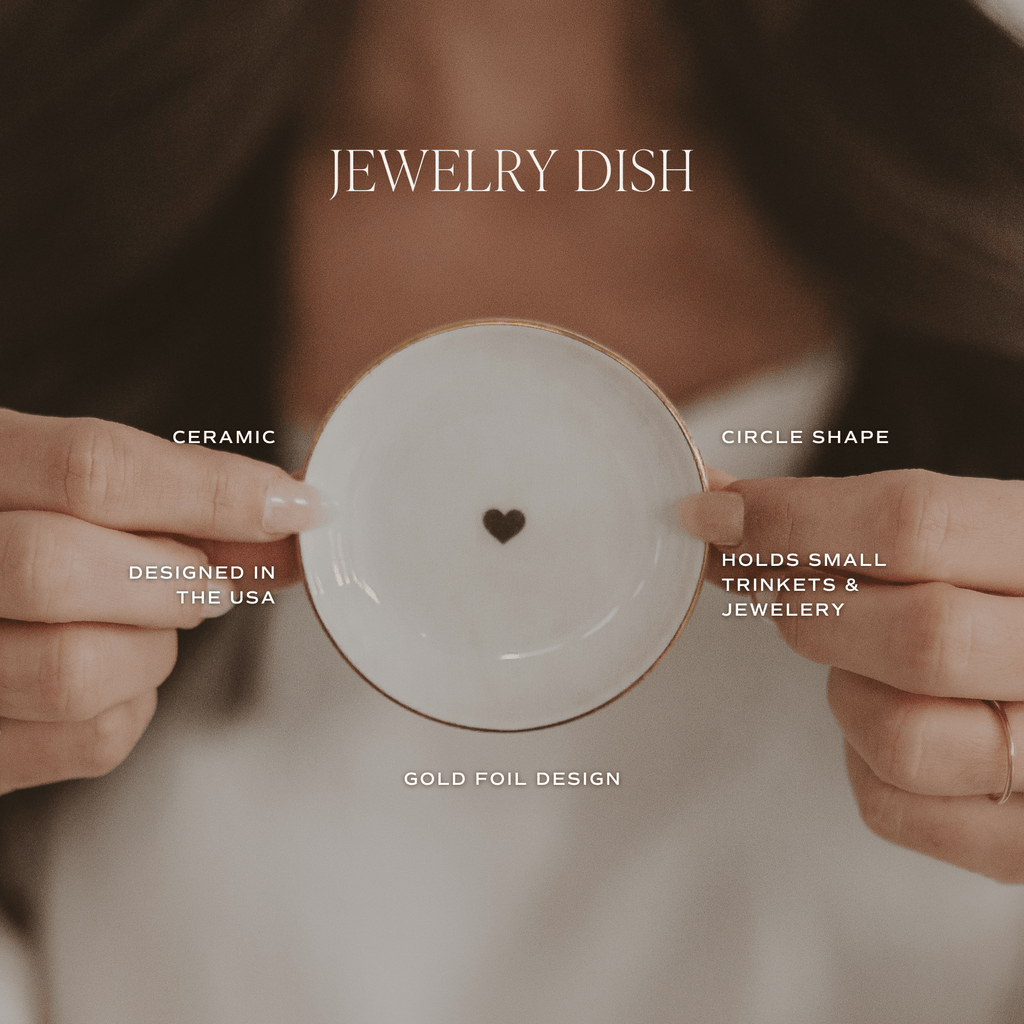 Hands holding the gold heart jewelry dish, with its features labeled