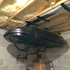 Cargo box stored on the hoist in a basement ceiling
