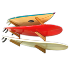 Surfboards stored on the TidyTimber 3-level wood wall rack