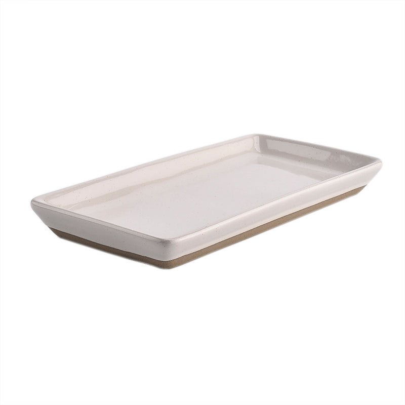 Rectangular cream speckled stoneware tray, 8 x 4 inches