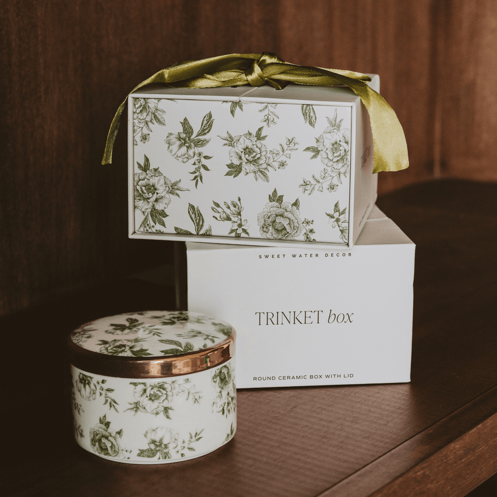 Green Delft trinket box beside its gift box