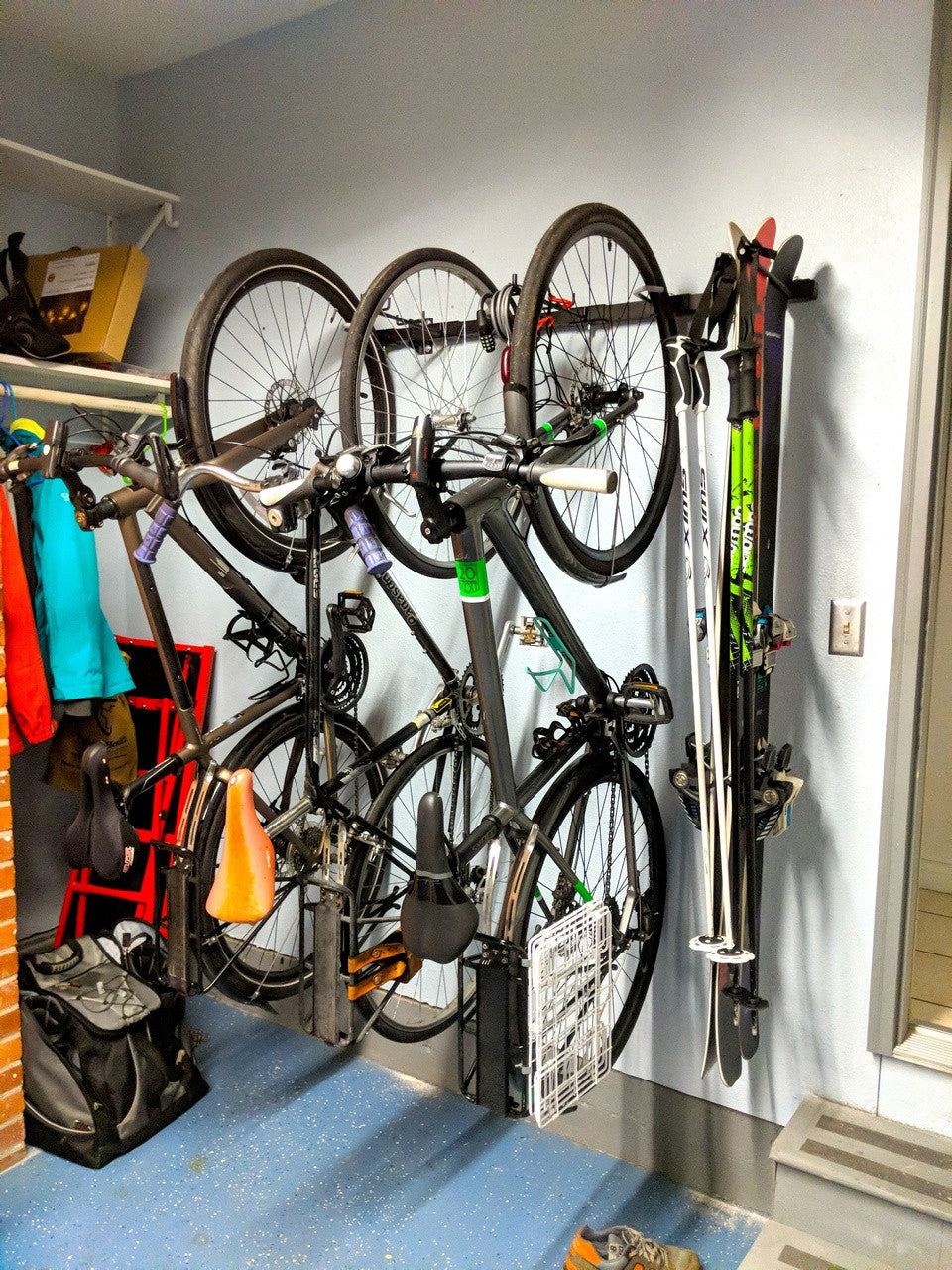Bikes and gear stored on the G-Adventure rack in a narrow storage room