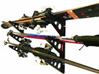 Skis and poles stored on the Trifecta racks