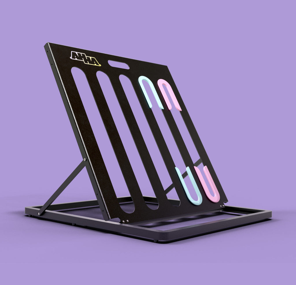 Folding bike stand with bike wheel slots, shown on a purple background