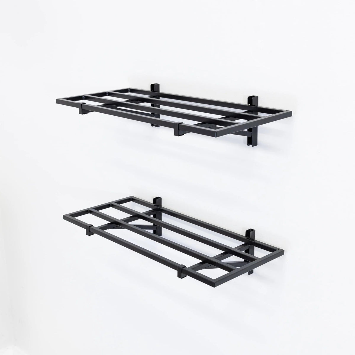 Two empty black 1 x 2 ft wall shelves