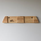 Empty Vail wood ski display rack, small