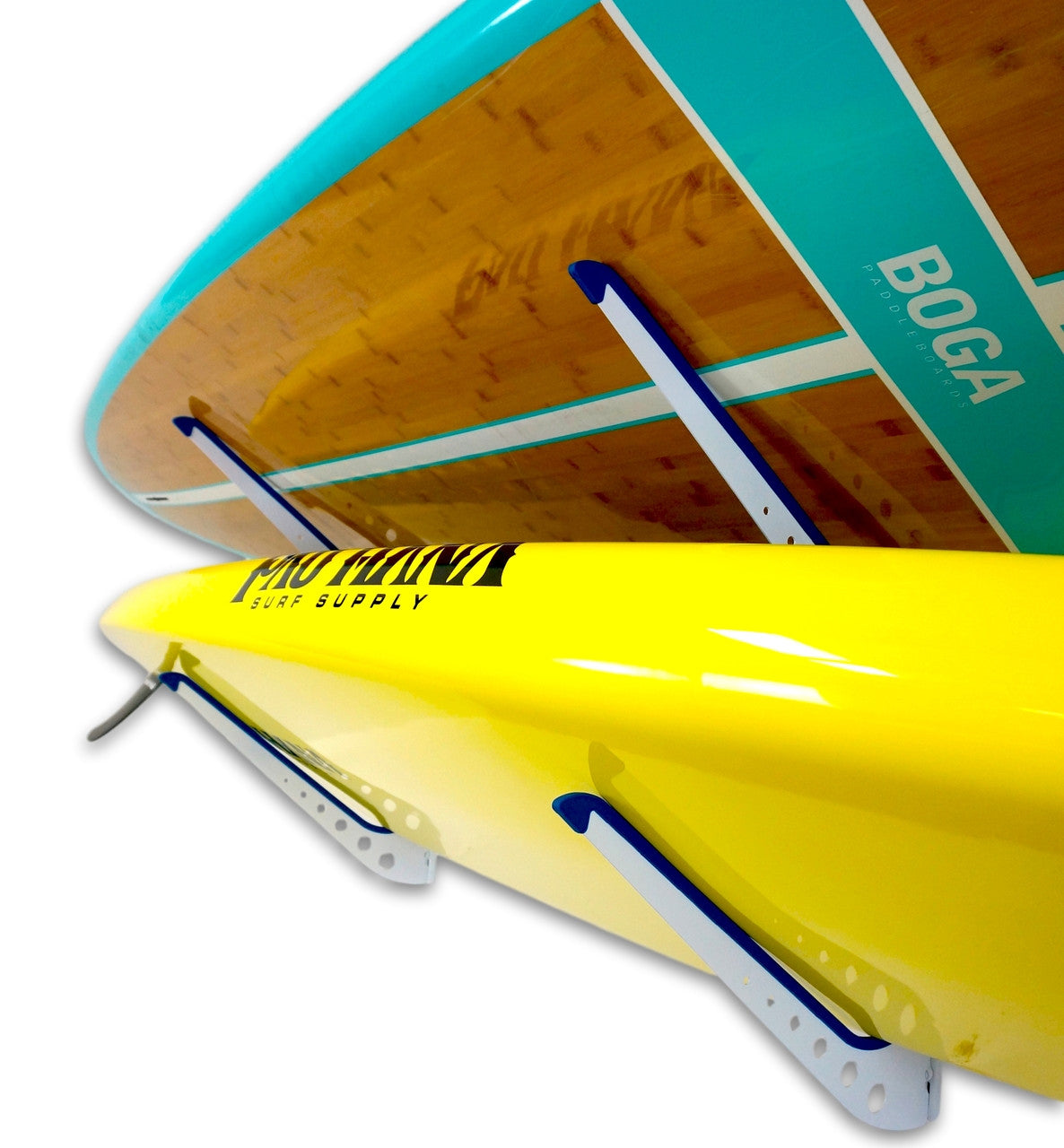 Close-up of paddleboards resting on the SUP rack arms