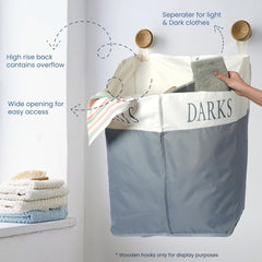 Gray and ivory laundry sorter separating light and dark clothes in a laundry room