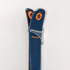 Close-up of ski tips held by the clear acrylic rack