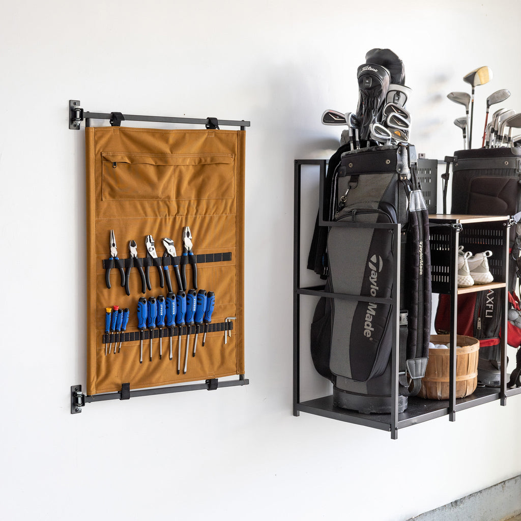 Tan Pivot Panel holding pliers and screwdrivers beside a golf organizer