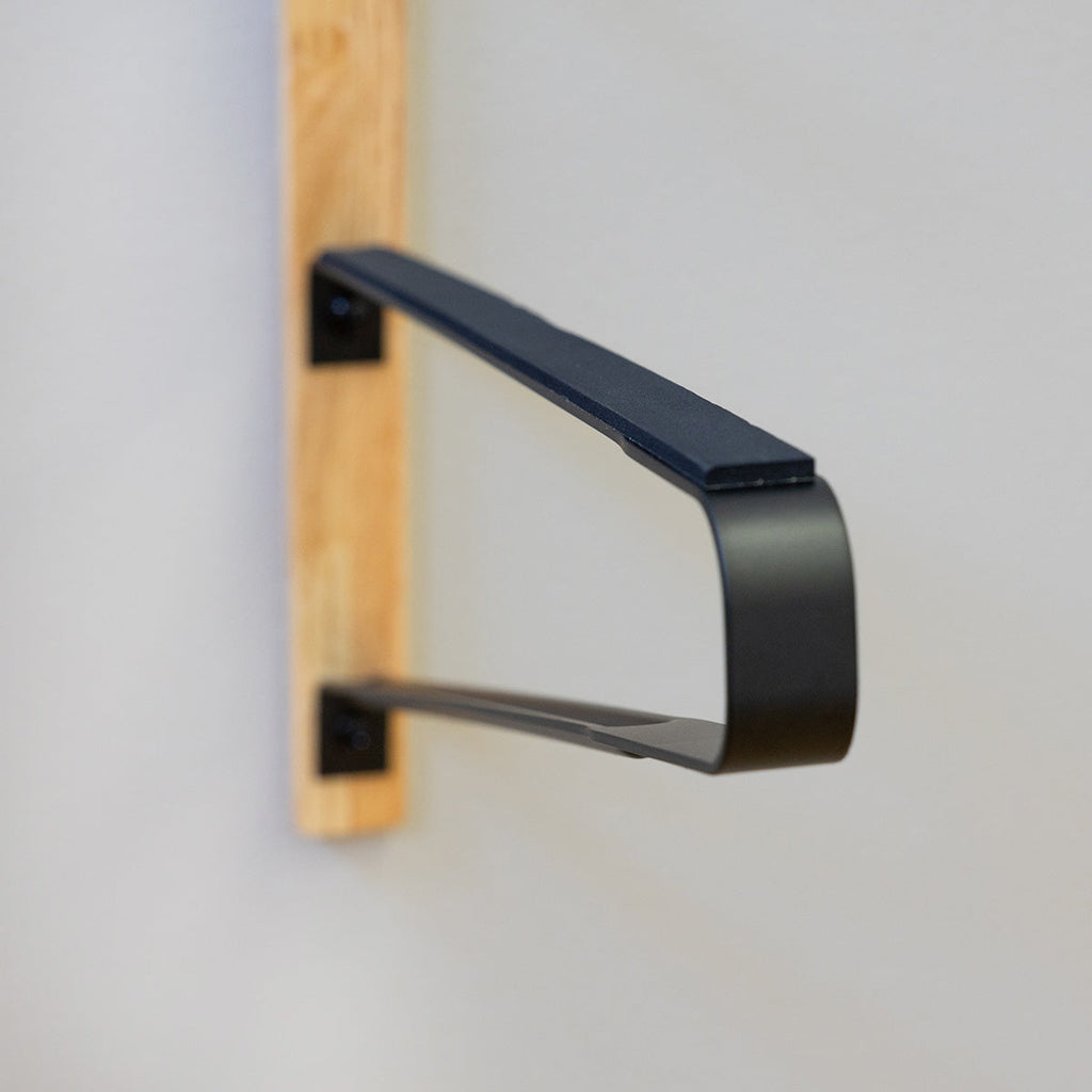Close-up of a padded surfboard rack arm