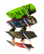 Four wakeboards stored on the white XSR wall racks